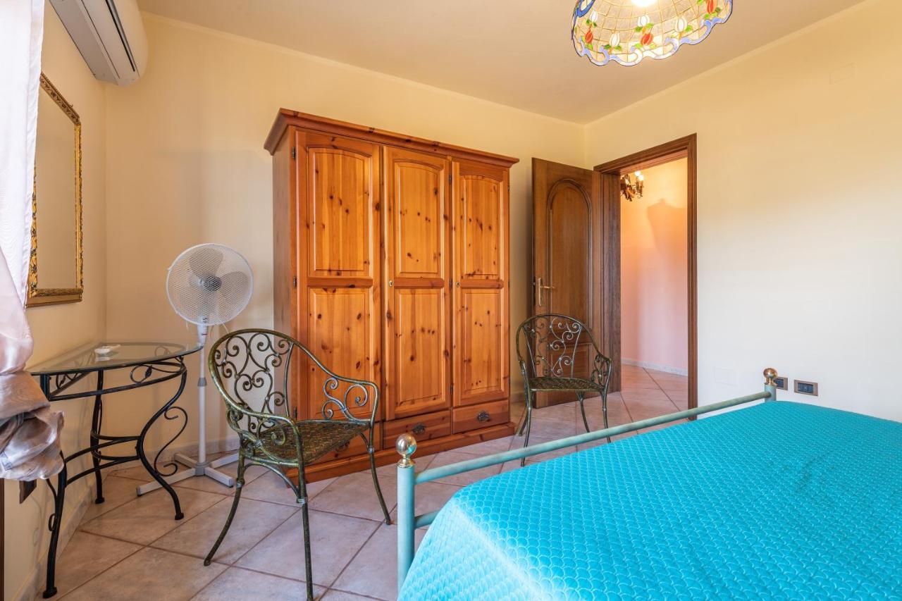 Appartamento Chia Grande Bagian luar foto